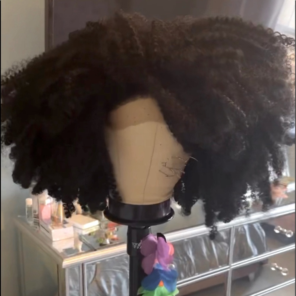 Beautiful and Eccentric Human hair kinky curly HD lacefront unit.